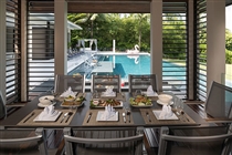 Poolside dining table